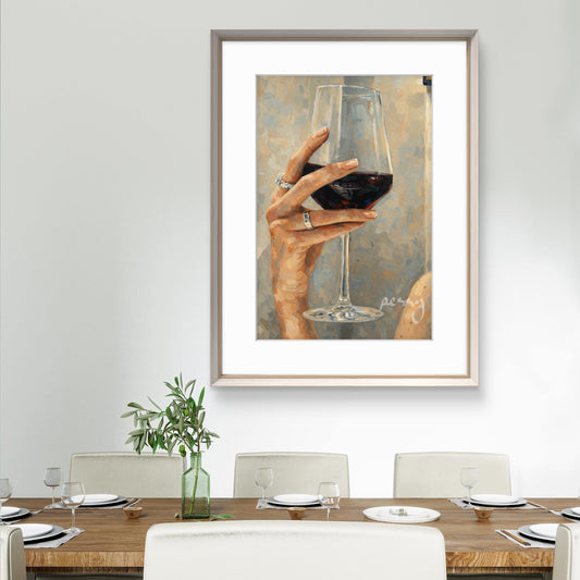 The one with the hand holding the wine glass