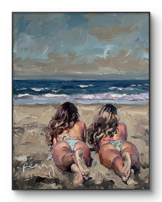 The one with her twin sister on the beach