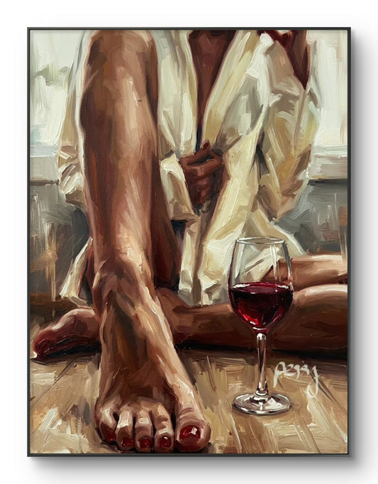 The one with the wine glass next ro her foot.