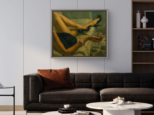The one on the sofa with wine