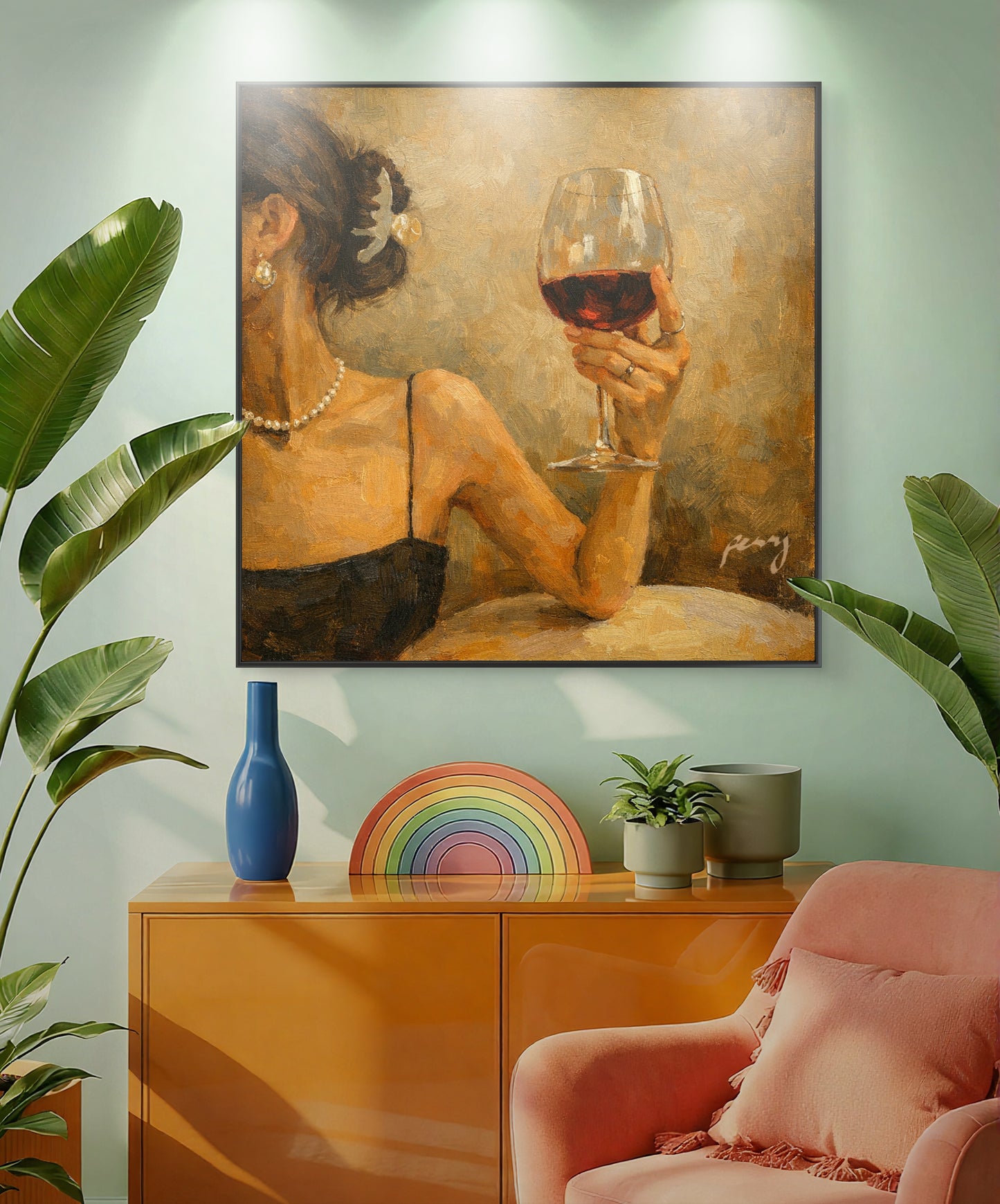 The one with the face away holding the wine glass