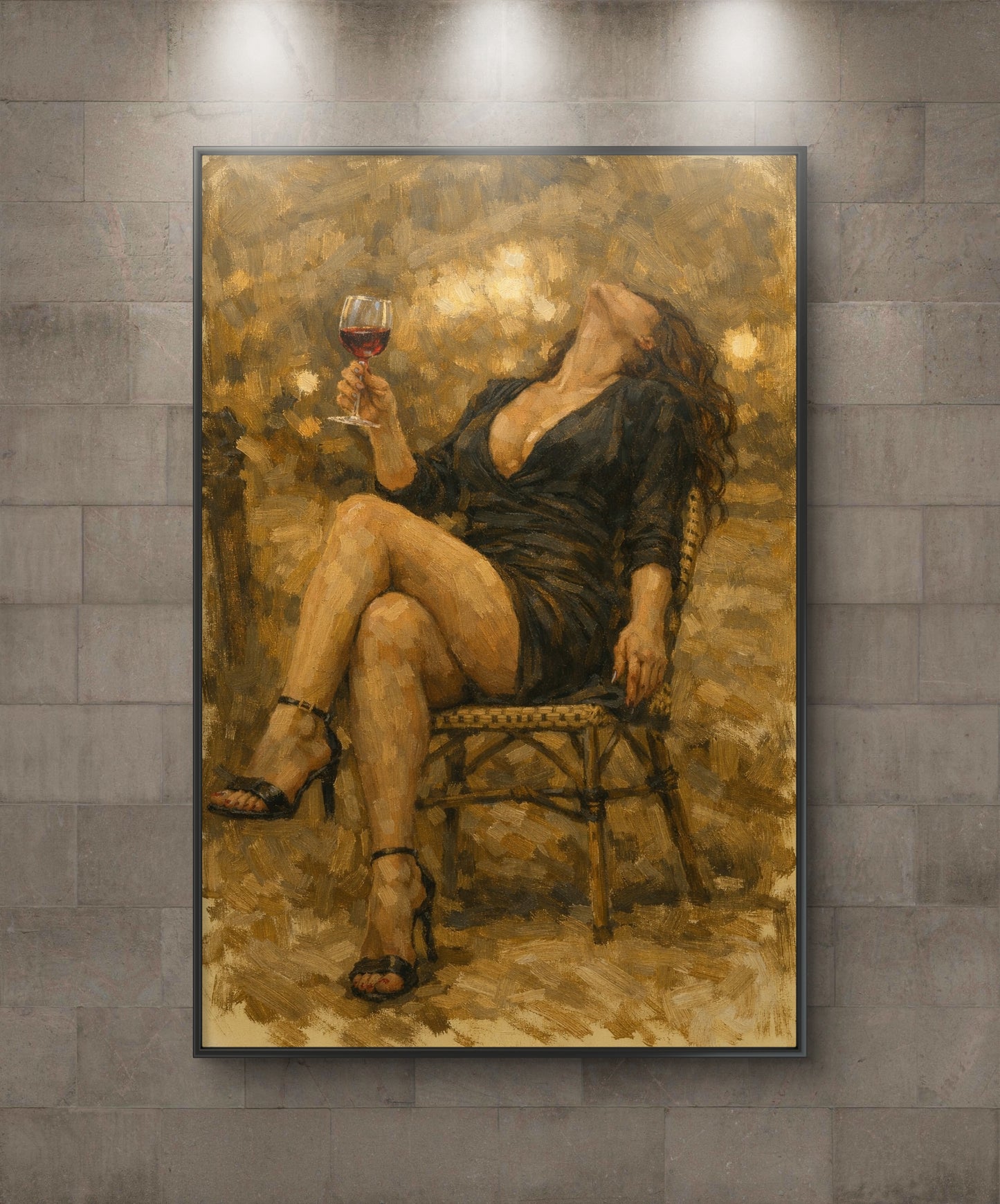 The one sitting on a chair and drinking wine