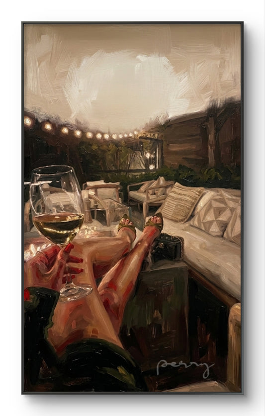 The one on the terrace drinking white wine