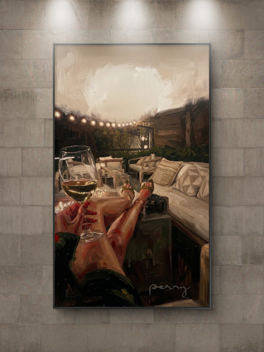 The one on the terrace drinking white wine